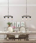 Dining room with Rustic Mason Jar Chandelier For Farmhouse Kitchen Island Lighting With Metal Finish And Glass Pendant Three Clear Mason Jars Hanging