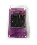 Noob Friendly Soldering Practice Kit for DIY Electronics Projects with purple circuit board, battery holder, and clear shell.