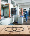 Two Pack 5M375 Lathe Drive Belt For WM210V Mini Lathe With 38mm Bore and polyurethane material on workbench in machine shop