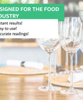 Quat Sanitizer Test Strips 100 Pack for Quaternary Sanitizing Solutions 0 to 500 Ppm with glasses in restaurant setting