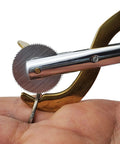 Ring Remover Jewelry Cutter For EMTs And Fire Rescue Pros with stainless steel wheel blade cutting a ring on finger
