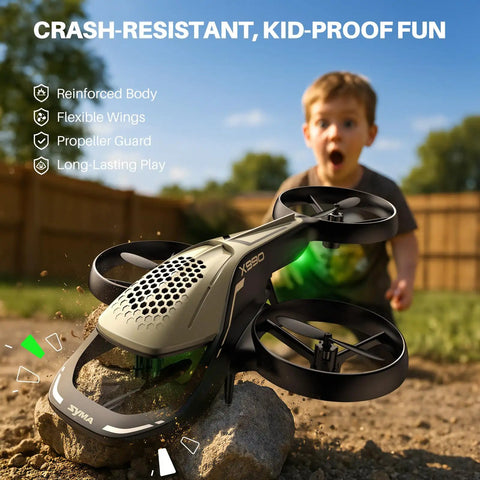 Epic Kids RC Helicopter With 360 Degree Propeller Protection on rocky terrain, child in background, outdoor play scene.