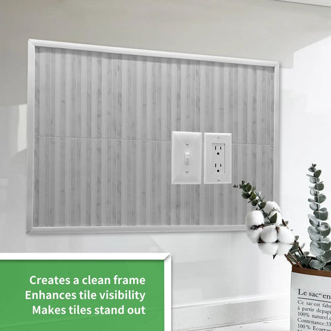 30 Ft Peel And Stick Trim For Walls And Backsplash Edges framing a tiled wall section around a power outlet, enhancing decor.