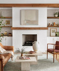 Living room with floating wall shelves set of 2, extra long 35.4 inch wide MDF rustic brown with steel brackets, decor displayed.