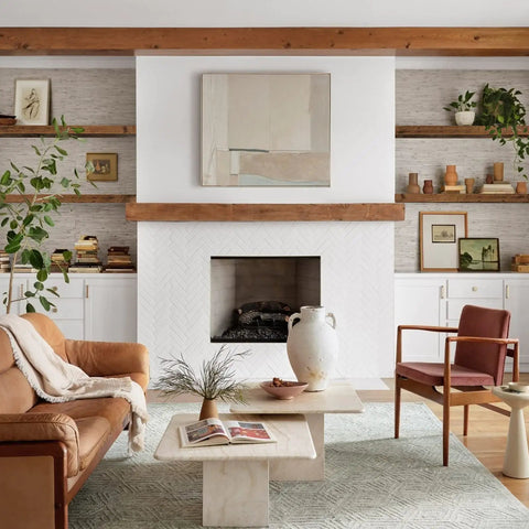 Living room with floating wall shelves set of 2, extra long 35.4 inch wide MDF rustic brown with steel brackets, decor displayed.
