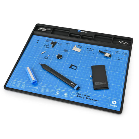 Magnetic FixMat Electronics Repair Mat With Dry Erase Grid And Sorting Bins displaying organized small parts on blue surface.