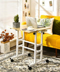 Hassle Free Rolling Height Adjustable Standing Desk With Easy Glide Casters And Extra Roomy Laptop Tray in cozy home office setup.