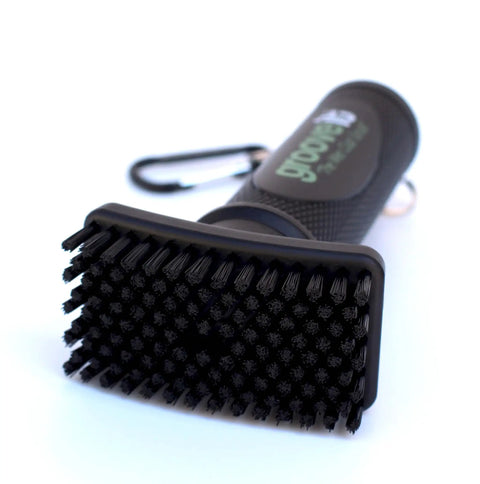 Close-up of Wet Club Scrub Golf Water Brush With Anti Leak Design showing magnetic nylon bristle head and carabiner clip.