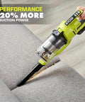 Heavy Hitting Cordless Stick Vacuum Cleaner With 18 Volt Battery And Quick Charger features a vacuum cleaning sofa gaps for debris.