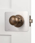 Top Grade Stainless Steel Door Lock Reinforcer Plates With Easy Install Adhesive Backing Perfect For Fixing Shaky Handles And Deadbolts While Boosting Home Security Plus Adding A Nice Decor Touch Without Screws Needed At All on white door knob