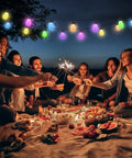 Smart RGB Outdoor String Lights 96ft With Independent Bulb Color Control illuminating a picnic scene with vibrant colors at night.