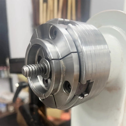 Metal woodturning chuck with Woodworm Screw for secure mounting of bowl blanks, fits most major chucks like Sorby and Nova.