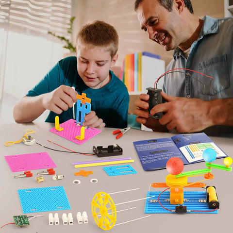 Father and son building Hands On Five Model STEM Science Kit For Kids Ages 6 7 8 9 10 11 12 Featuring Telegraph Newtons Cradle
