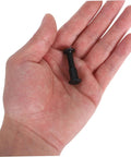Rock Solid Cross Locking Screws And Nuts 170 Piece Set Matte Black Steel in hand, showing detailed construction for furniture use.
