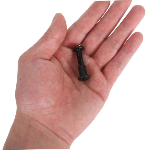Rock Solid Cross Locking Screws And Nuts 170 Piece Set Matte Black Steel in hand, showing detailed construction for furniture use.