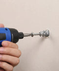 Installing Heavy Duty Zinc Alloy Drywall Anchor Kit With Self Drilling Screws 30 Pack on drywall using a drill