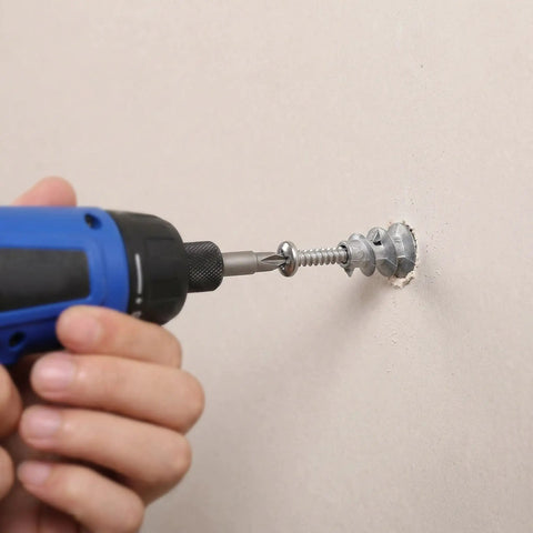 Installing Heavy Duty Zinc Alloy Drywall Anchor Kit With Self Drilling Screws 30 Pack on drywall using a drill