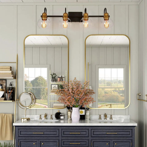Bathroom with 4 Light Modern Farmhouse Vanity Light Fixture in Black with Oil Rubbed Bronze Finish and Clear Globe Glass Shades.
