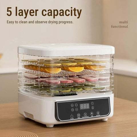 Top Shelf Five Tray Electric Food Dehydrator Featuring Killer 360 Airflow And Smart Controlled Digital Timer To Nail Fresh Fruit Veggies Meat And Healthy Homemade Snacks Daily with five trays of drying fruits.