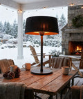 Electric Outdoor Infrared Heater 1500W For Indoor And Outdoor Patio Use IP55 Waterproof on a wooden table in snowy patio