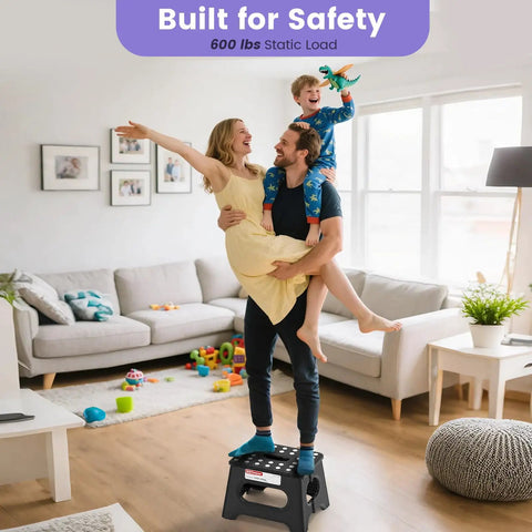 Family standing on Folding Step Stool Nine Inch Holds Up To 600 Lb With Non Slip Surface And Carry Handle in living room.