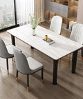 Rock Solid Metal Table Legs Slick Matte Black Industrial Desk Base Heavy Duty Steel Frame With Self Leveling Foot Pads And No Sweat Hardware For Office Or Dining Table Setup in a modern dining setup with white and gray chairs.