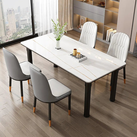 Rock Solid Metal Table Legs Slick Matte Black Industrial Desk Base Heavy Duty Steel Frame With Self Leveling Foot Pads And No Sweat Hardware For Office Or Dining Table Setup in a modern dining setup with white and gray chairs.