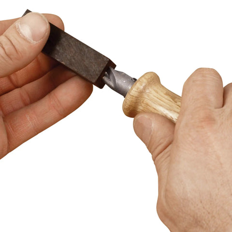 Person holding Pen Turning Barrel Mill Trimmer And Cleaner Pro Kit with wooden handle and cutting head in use
