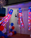 Three Pack 60 Inch American Flag Windsocks With Red White Blue LED Lights For Outdoor Yard Decor on porch with fireworks