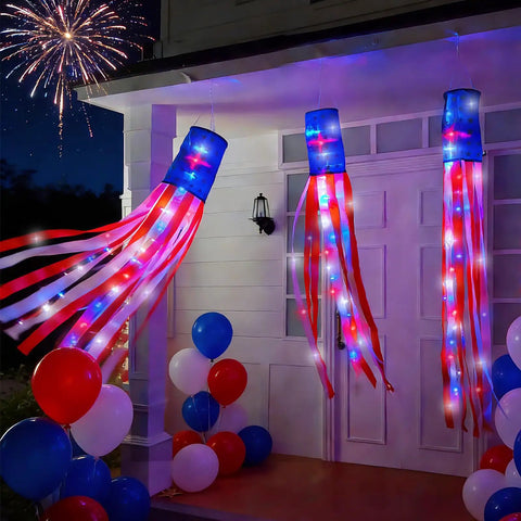 Three Pack 60 Inch American Flag Windsocks With Red White Blue LED Lights For Outdoor Yard Decor on porch with fireworks