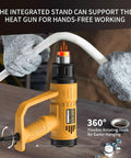 Go-To Heavy Duty 1800W Heat Gun Kit With Dual Temperature 662F And 1112F held by gloved hands bending tubing