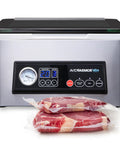 Front view of Avid Armor Ultra Series vacuum sealer in stainless steel with digital controls; two vacuum-sealed steaks.