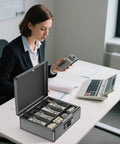 Locking Cash Box With Money Tray And Key For Grab And Go Security Portable Cash Safe Box shown on office desk