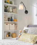 Hardwired Wall Sconces Set Of Two With 180 Degree Swing Arm Matte Black Dope Industrial Vintage Lighting White Fabric Shade Pull Chain On Off E26 Base Bulbs Not Included For Bedroom Living Room Farmhouse Decor mounted on white paneled wall
