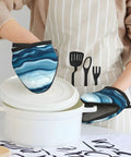 Hot Kitchen Gear Mini Oven Mitts With Non Slip Silicone Grip and Heat Resistant Cotton Padding for safely handling pans.