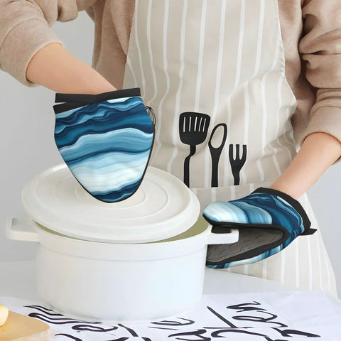 Hot Kitchen Gear Mini Oven Mitts With Non Slip Silicone Grip and Heat Resistant Cotton Padding for safely handling pans.