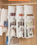 2 Pack Hanging Handbag Organizer for Closet with 8 Pockets Space Saving Purse Storage for Medium Purses and Bags Durable Polyester PVC Washable Wardrobe Organizer Easy to Install Light Gray, shown in a closet with purses.