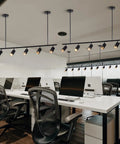 Office space with 5 Light LED Track Lighting Kit in black, featuring flexible rotatable heads above a modern workspace