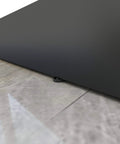 Close-up of Dope Mirrored Glass Sliding Barn Door In Black MDF With Hardware Kit showing bottom edge and floor guide.