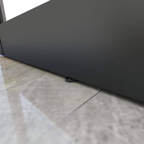 Close-up of Dope Mirrored Glass Sliding Barn Door In Black MDF With Hardware Kit showing bottom edge and floor guide.