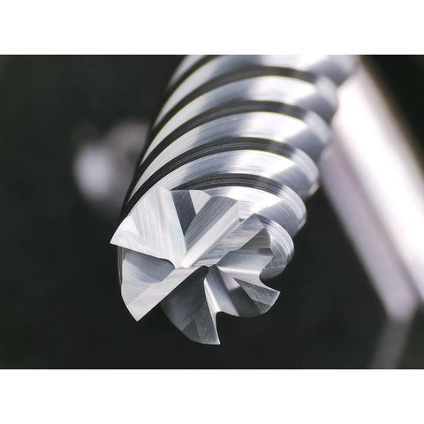 Close-up of six flute carbide end mill square cutter with fifty degree high helix for high hardness steel finishing.