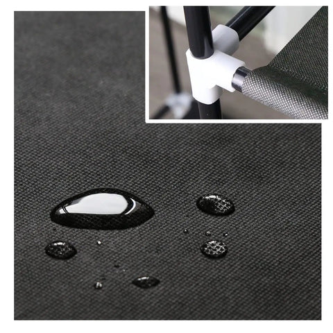Close-up of non-woven cover with water droplets for Space Saving Portable Wardrobe Closet With 43 Inch Frame Non Woven Cover Two Hanging Rods And Dual Storage Shelves In Brown Quick And Easy Assembly For Clothes Organization