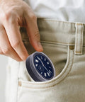 Person placing Portable Watch Dial Storage Box With Dust Proof And Scratch Proof Movement Holder Case in pocket