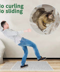Man slipping on rug, highlighting Double Sided Non Slip Rug Tape Set 16 Pieces Reusable And Washable; cat lying safely on rug