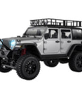1/12 Scale RC Rock Crawler Wrangeler Style Jeep Pickup 4x4 With 2.4GHz Remote Ready To Run Off Road Climbing Car Upgraded Chassis Realistic Design Durable Build For Serious Trail Rides And Weekend Adventures in silver with roof rack and LED lights