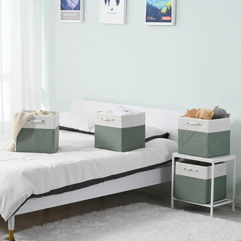13x13 Fine Linen Storage Bins With Handles, Fabric Cube Boxes For Shelves And Closets, White And Green 4 Pack, Foldable, on bed