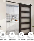 36 Inch By 84 Inch Glass Barn Door With 6.6 Foot Sliding Door Hardware Kit Included And Handle Five Panel Frosted Glass Solid Wood Slab With Waterproof PVC Surface For Privacy And Durability Pre Drilled For Easy Assembly Brown installed in modern kitchen.