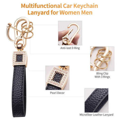 Multifunctional car keychain with detailed gold accents and black leather lanyard, showcasing anti-lost D ring and decorative pearl.