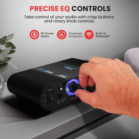 Person adjusting Wireless Bluetooth Home Audio Amp With 90W Dual Channel Power For Studio And PA Use Low Distortion Stereo Receiver