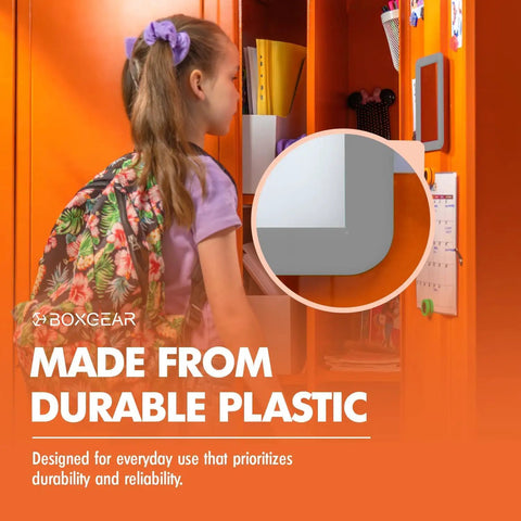 Girl looking at Magnetic Locker Mirror Grab And Go 5 By 7 Inches Portable Gray in locker, durable plastic detail shown.